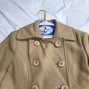 Tan/beige long over coat. From Victoria Secret.